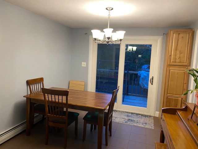 dining room with tile patterned flooring, a chandelier, and a baseboard radiator