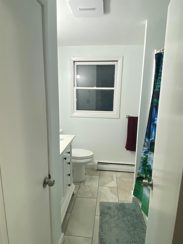 bathroom with a baseboard heating unit, a shower with curtain, vanity, and toilet