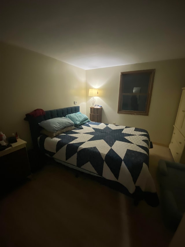 bedroom featuring carpet flooring