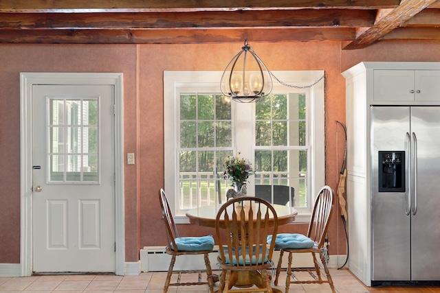 tiled dining area featuring an inviting chandelier, beam ceiling, and baseboard heating