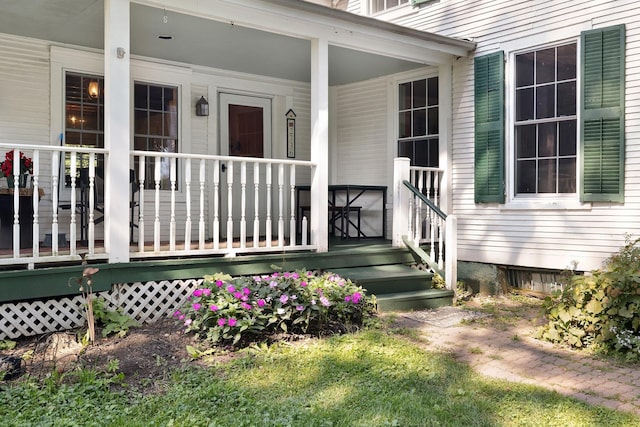 entrance to property with a porch