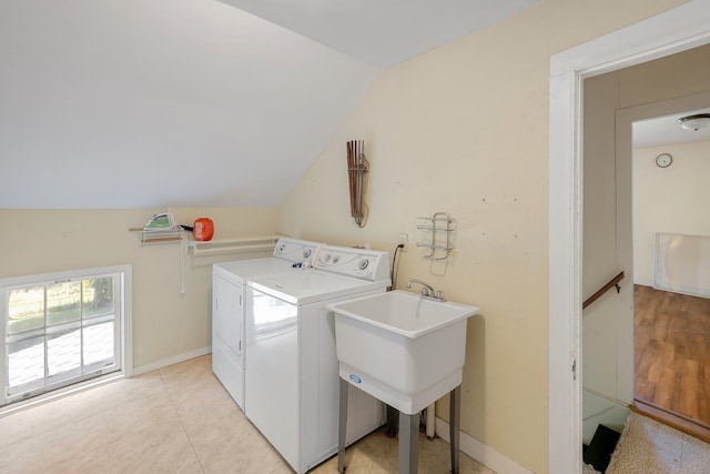 laundry room featuring sink and washing machine and dryer