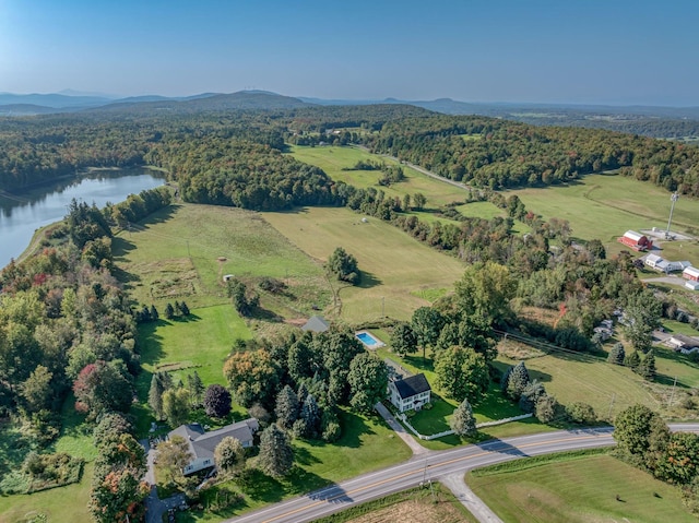 aerial view with a rural view and a water view