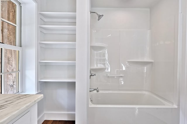 bathroom featuring shower / washtub combination