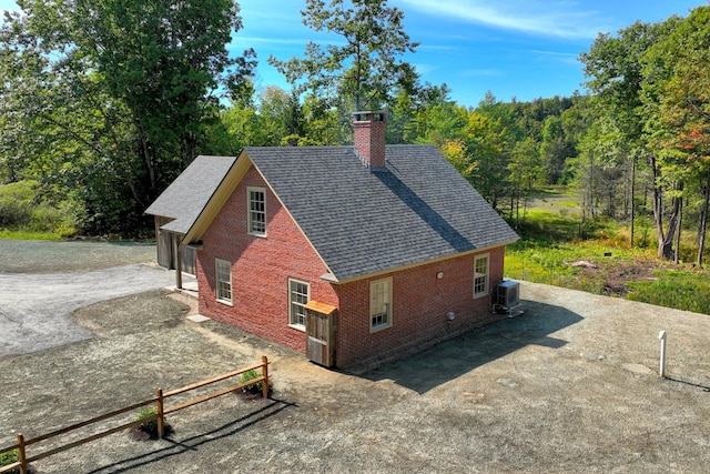 view of home's exterior featuring central AC