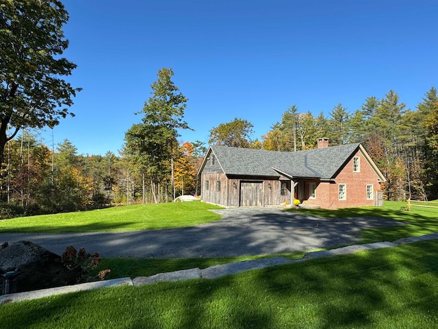 view of home's exterior featuring a yard