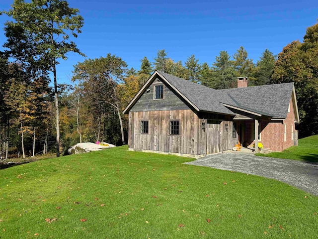 exterior space with a lawn