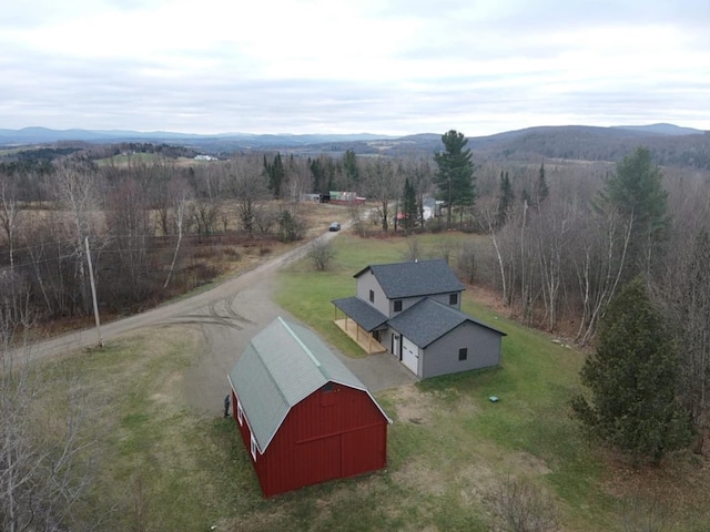 birds eye view of property featuring a mountain view