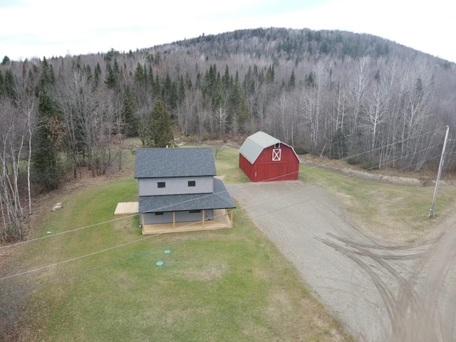 birds eye view of property with a mountain view