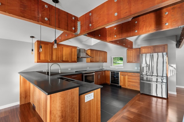 kitchen with wall chimney exhaust hood, stainless steel appliances, wine cooler, and decorative light fixtures