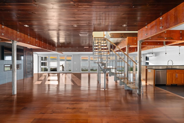 interior space with sink, dark hardwood / wood-style flooring, and wooden ceiling