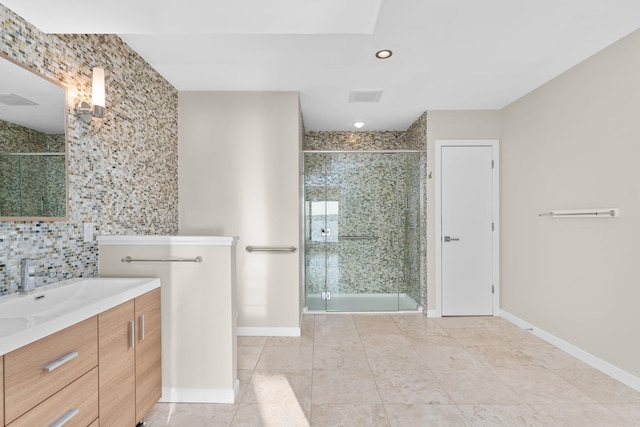 bathroom featuring walk in shower, vanity, tile walls, and tile patterned flooring