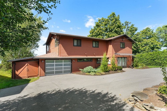 front of property featuring a garage