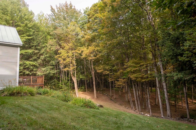 view of yard with a wooden deck