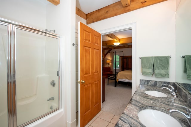 bathroom with tile patterned flooring, beamed ceiling, vanity, and bath / shower combo with glass door