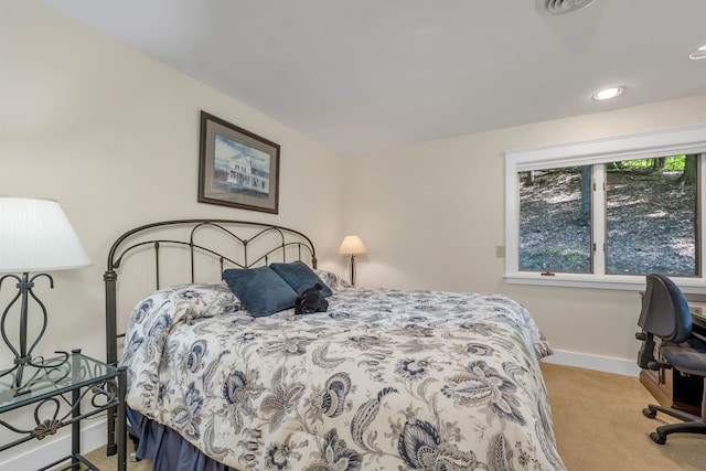 bedroom with light carpet