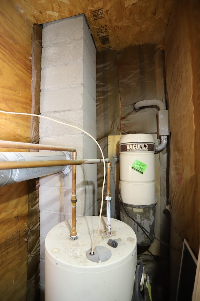 utility room with water heater