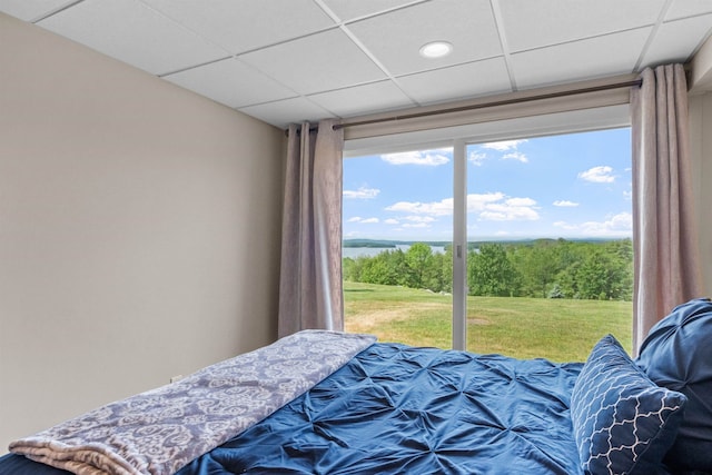 bedroom with a paneled ceiling