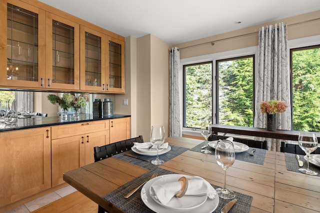 dining room featuring light tile patterned flooring