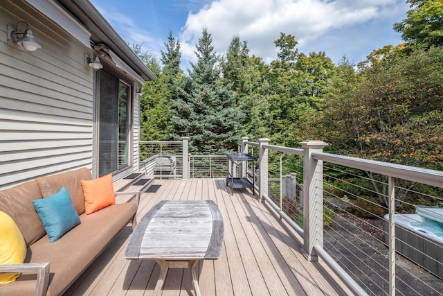 deck featuring an outdoor living space and central AC unit