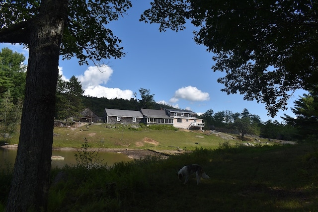 view of yard with a water view