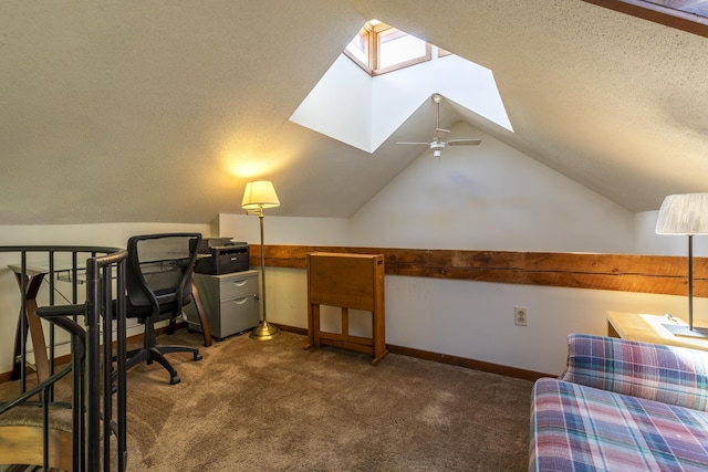 27 Lawrence Hill Rd Unit 5, Weston, VT 05161 - carpeted office with a skylight, vaulted ceiling, baseboards, ceiling fan, and a textured ceiling