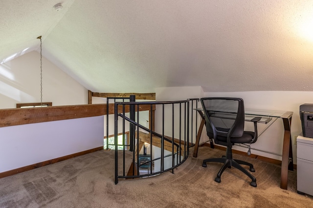 27 Lawrence Hill Rd Unit 5, Weston, VT 05161 - carpeted office featuring lofted ceiling, baseboards, and a textured ceiling