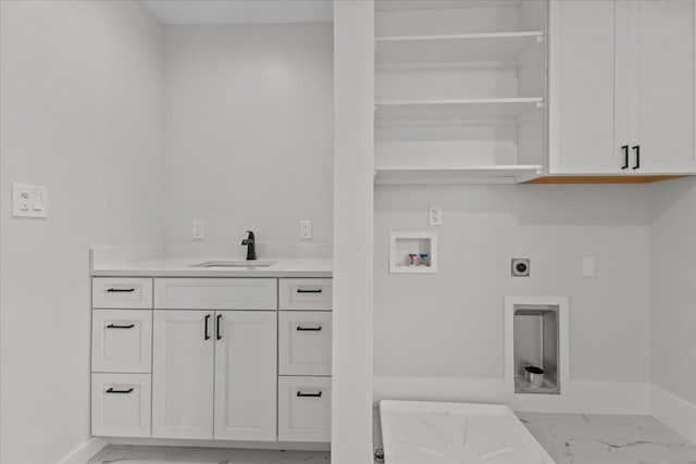 laundry area with washer hookup, cabinets, sink, and electric dryer hookup