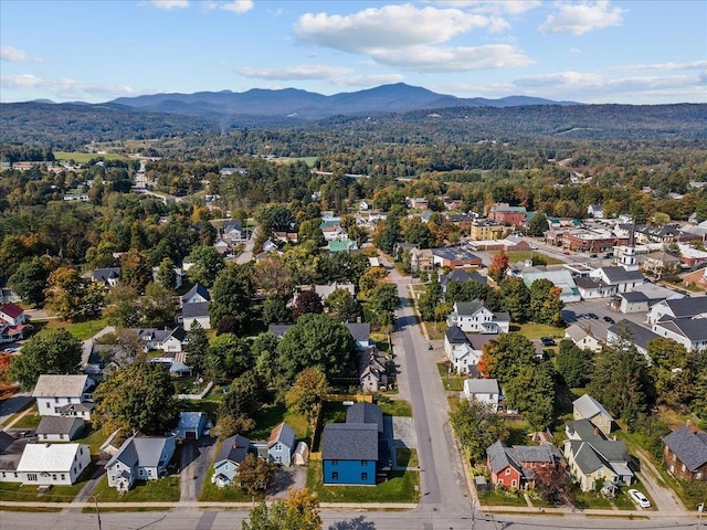 birds eye view of property featuring a mountain view