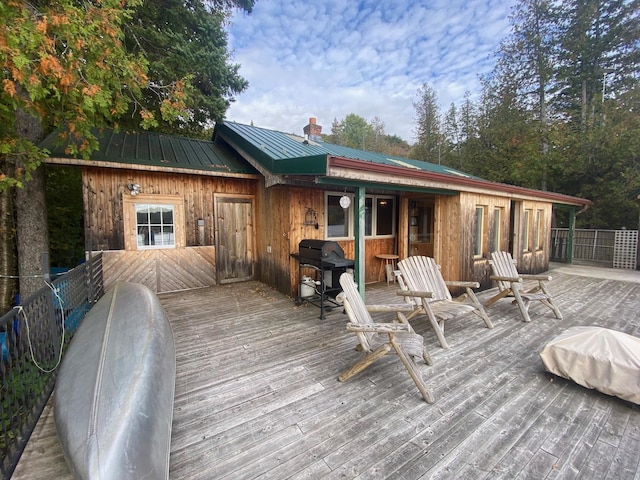 wooden terrace with grilling area