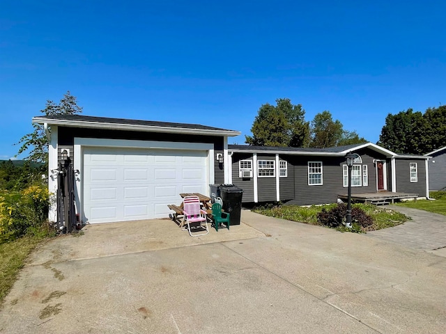 ranch-style home with a garage