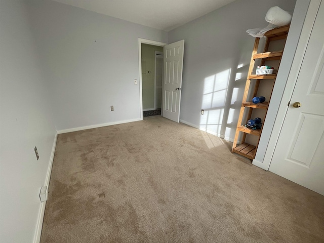 empty room with light colored carpet