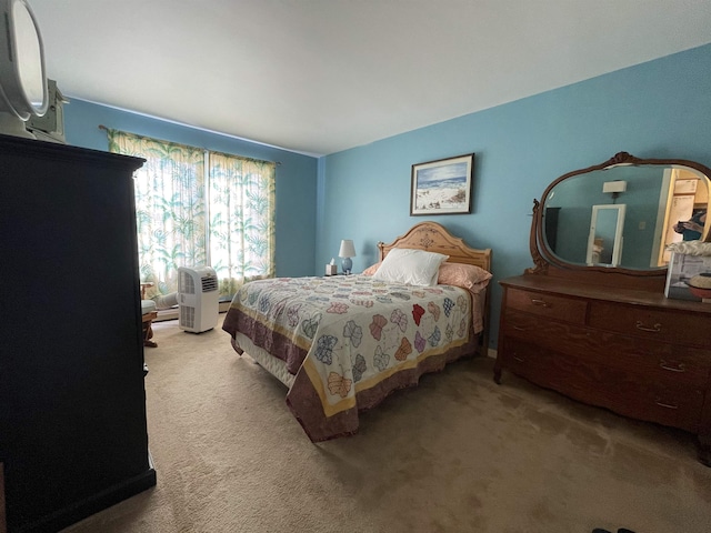 bedroom with light carpet