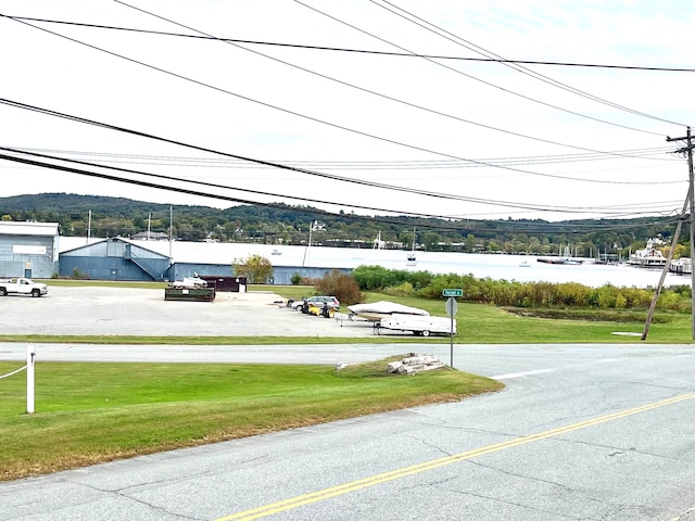 view of road featuring a water view