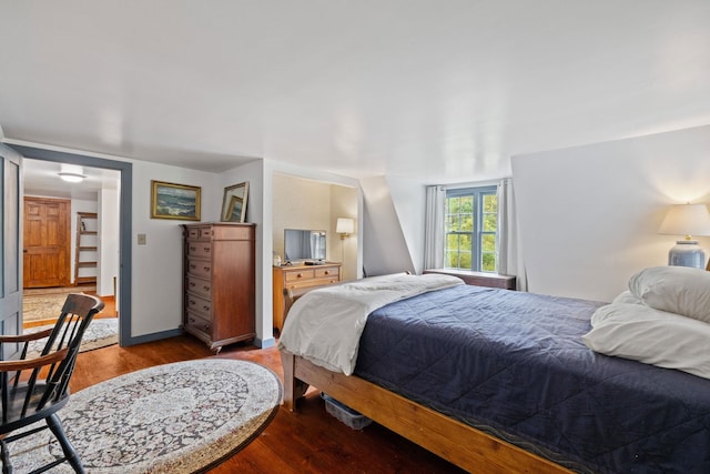 bedroom featuring wood-type flooring