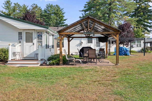 view of yard with a patio and a gazebo