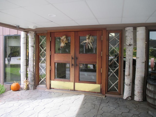 entrance to property with french doors and a patio