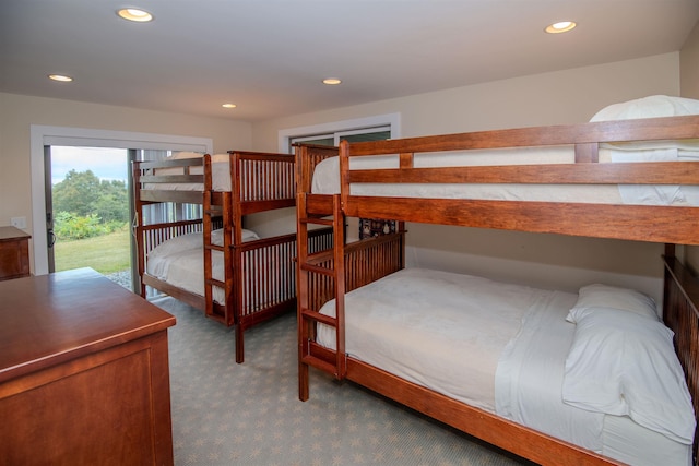 226 Okemo Trailside Ext Unit 47C, Ludlow, VT 05149 - carpeted bedroom with recessed lighting and access to exterior