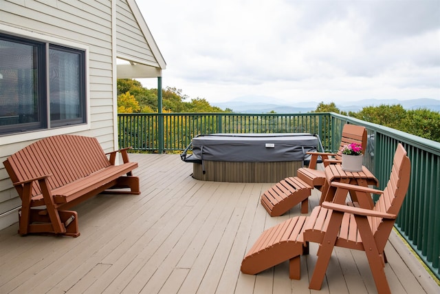 226 Okemo Trailside Ext Unit 47C, Ludlow, VT 05149 - wooden terrace with a mountain view and a hot tub