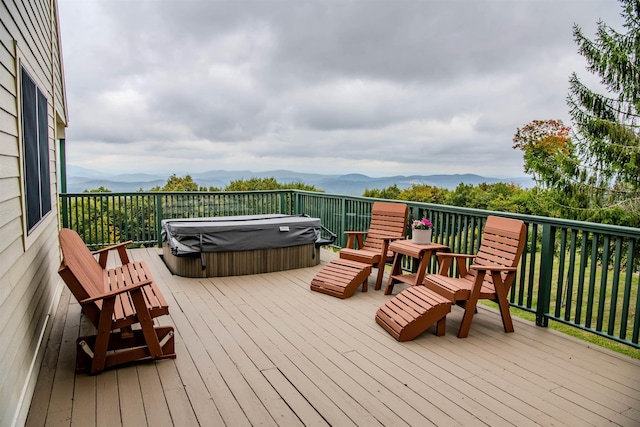 226 Okemo Trailside Ext Unit 47C, Ludlow, VT 05149 - wooden terrace with a mountain view and a hot tub