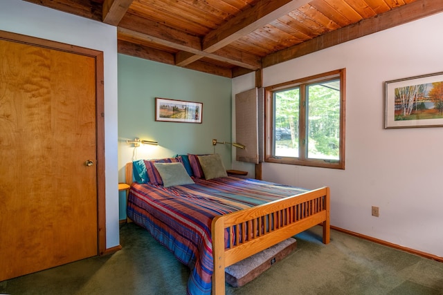 bedroom featuring wood ceiling, beam ceiling, and dark carpet