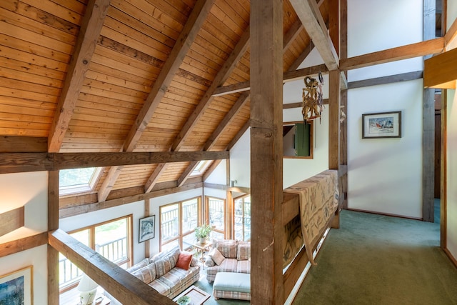 hall featuring wood ceiling, dark carpet, beamed ceiling, and high vaulted ceiling