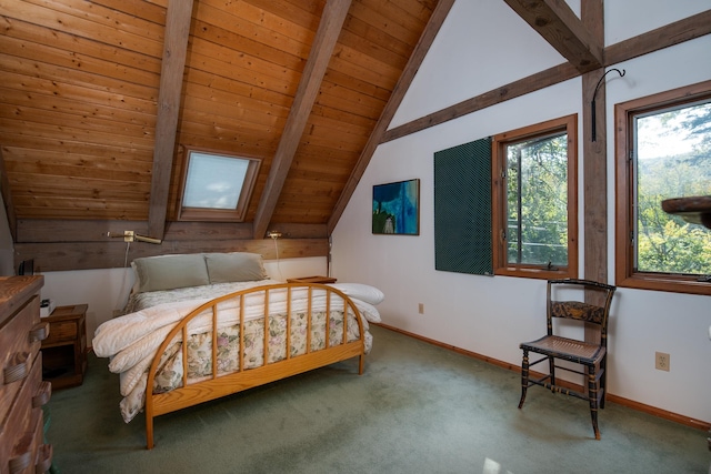 carpeted bedroom featuring vaulted ceiling with skylight and wood ceiling