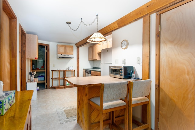 kitchen featuring kitchen peninsula, decorative light fixtures, stainless steel appliances, range hood, and light brown cabinetry