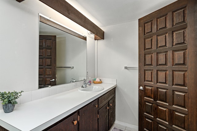 bathroom with vanity and tile patterned floors