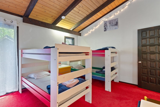 carpeted bedroom featuring wood ceiling and lofted ceiling with beams