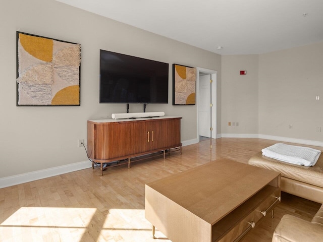 living room with light hardwood / wood-style floors