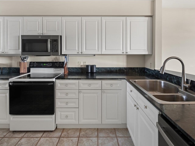 kitchen featuring white cabinetry, sink, and stainless steel appliances