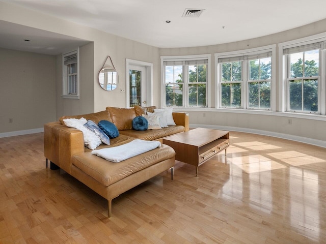 living room with light hardwood / wood-style floors