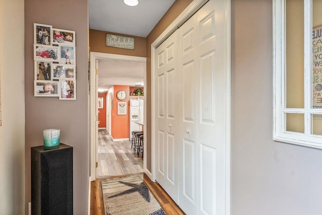 hallway featuring light hardwood / wood-style floors